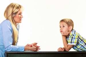 Mother Talking With Son. Children Upbringing.